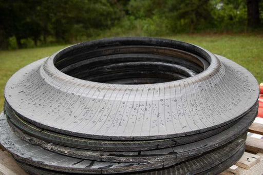 Stack of Black Tire Rings for Traffic Drum