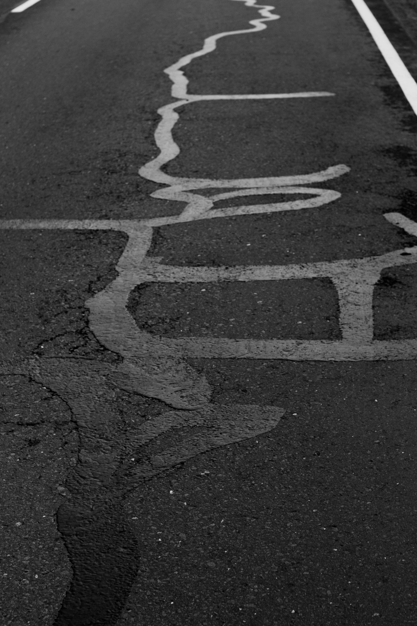 Black Asphalt with white traffic lines