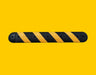 black Bumpie Speed Bump with diagonal yellow lines against yellow background