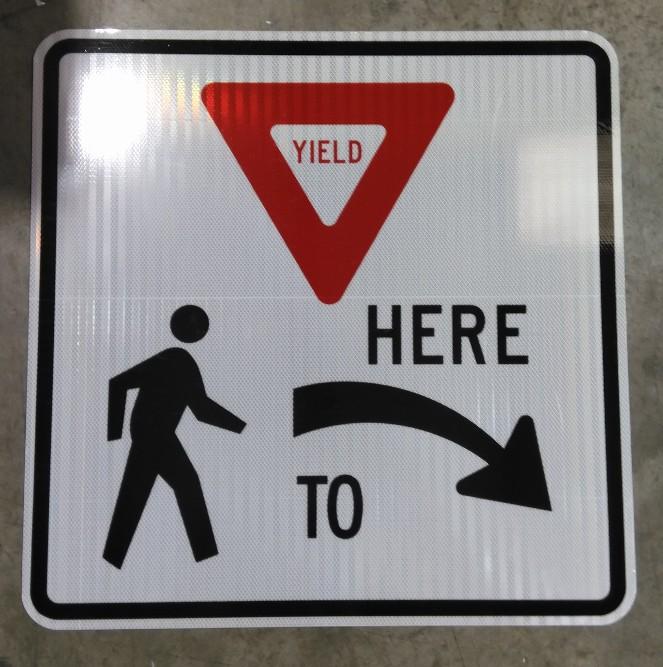 Yield Here For Pedestrians Symbol High Intensity Prismatic (HIP) Sign, Right Arrow | 30" x 30"