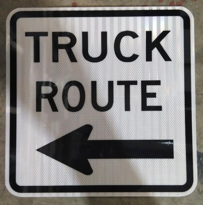 White and Black Truck Route Sign with black left arrow R14-1